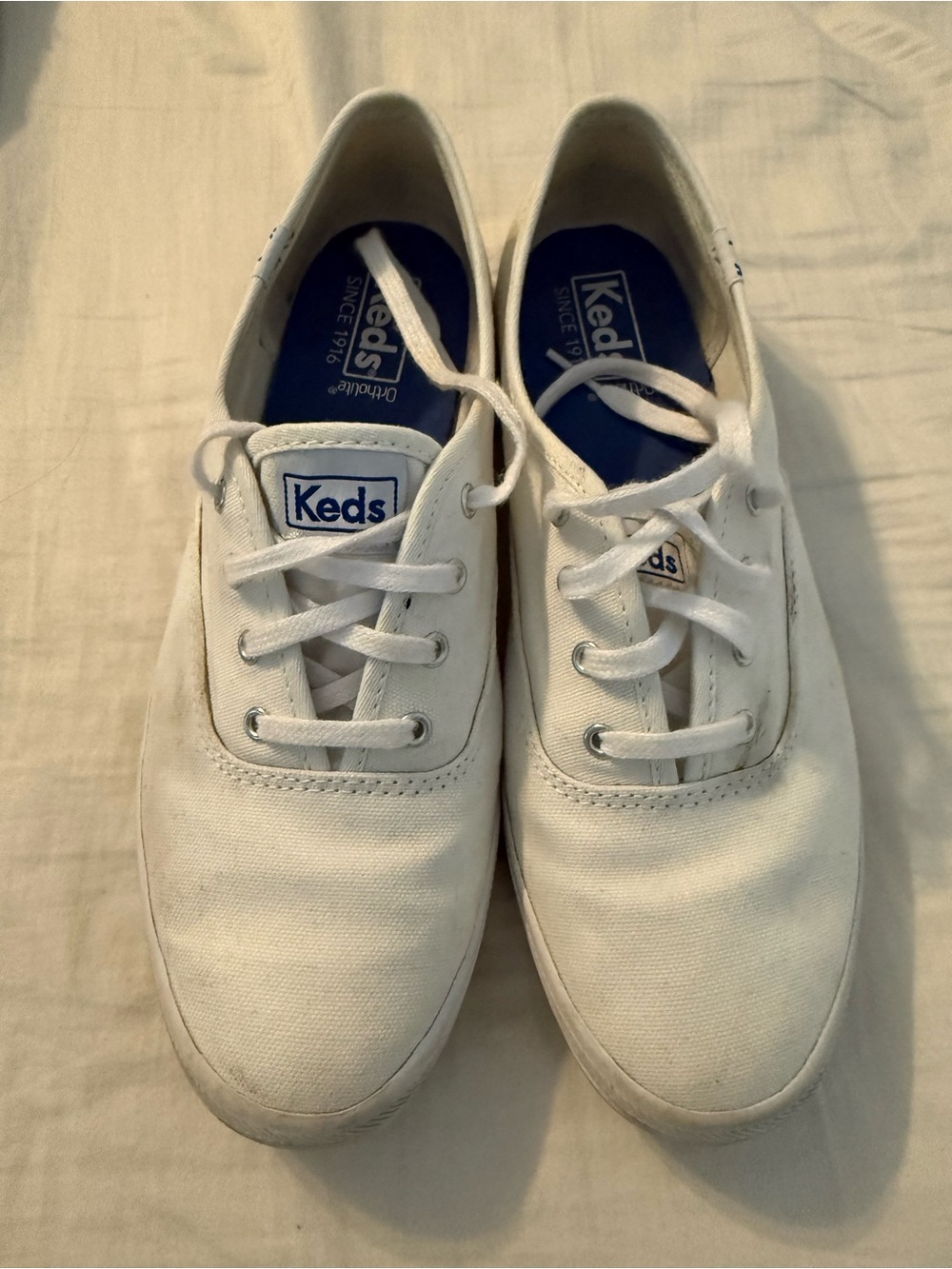 Keds White Canvas Lace-Up Sneakers with Blue Insole Accents
